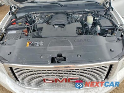 Zdjęcie 12 z 14 samochodu: 2017 GMC YUKON DENALI VIN:1GKS2CKJ9HR126119 - miniatura