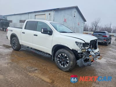 Czwarte zdjęcie samochodu z boku: 2024 NISSAN TITAN PRO-4X VIN:1N6AA1ED2RN104764 - miniatura