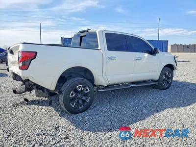 Trzecie zdjęcie samochodu z tyłu: 2023 NISSAN TITAN PLATINUM RESERVE VIN:1N6AA1ED8PN118469 - miniatura