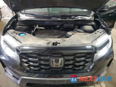 Zdjęcie 12 z 12 samochodu: 2022 HONDA PASSPORT ELITE VIN:5FNYF8H07NB014751 - miniatura