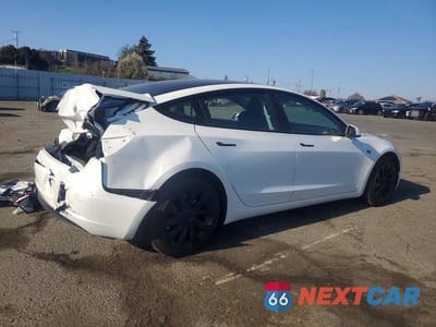 Trzecie zdjęcie samochodu z tyłu: 2023 TESLA MODEL 3 VIN:5YJ3E1EA5PF470588 - miniatura