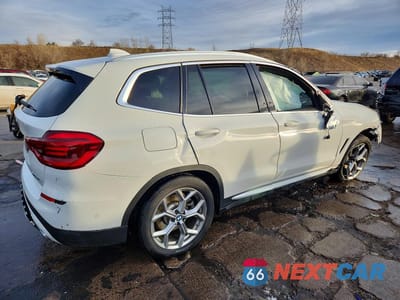 Trzecie zdjęcie samochodu z tyłu: 2021 BMW X3 XDRIVE30E VIN:5UXTS1C02M9E39311 - miniatura