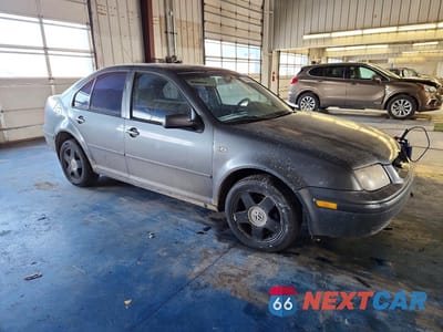 Czwarte zdjęcie samochodu z boku: 2003 VOLKSWAGEN JETTA GLS TDI VIN:3VWSP29M03M141526 - miniatura