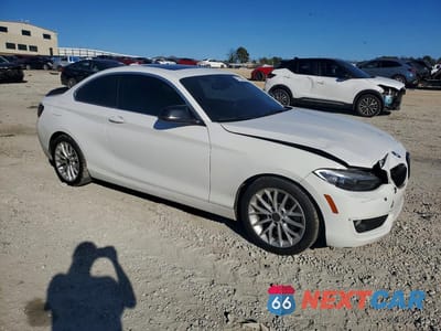 Czwarte zdjęcie samochodu z boku: 2014 BMW 228 I VIN:WBA1F5C54EVW97977 - miniatura
