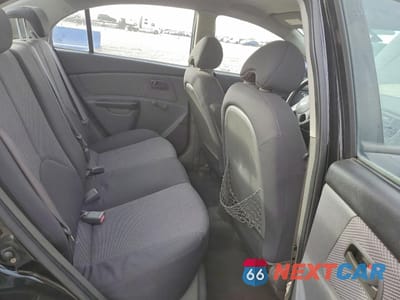 Zdjęcie 10 z 13 samochodu: 2010 KIA RIO LX VIN:KNADH4A34A6613356 - miniatura