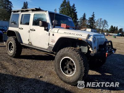 Czwarte zdjęcie samochodu z boku: 2010 JEEP WRANGLER UNLIMITED RUBICON VIN:1J4HA6H16AL119021 - miniatura