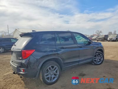 Trzecie zdjęcie samochodu z tyłu: 2023 HONDA PASSPORT EXL VIN:5FNYF8H51PB011830 - miniatura