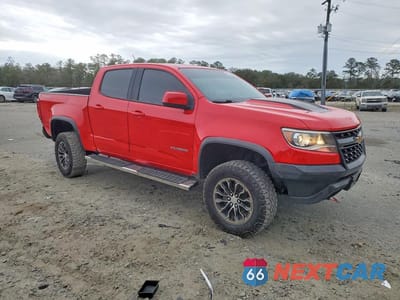 Czwarte zdjęcie samochodu z boku: 2018 CHEVROLET COLORADO VIN:1GCGTEEN4J1282663 - miniatura