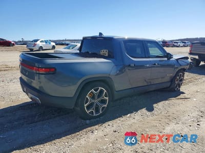 Trzecie zdjęcie samochodu z tyłu: 2022 RIVIAN R1T LAUNCH EDITION VIN:7FCTGAAL2NN011562 - miniatura