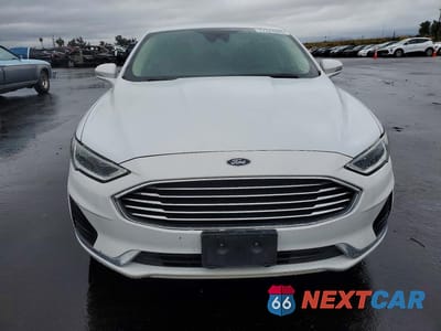 Piąte zdjęcie samochodu w środku: 2019 FORD FUSION SEL VIN:3FA6P0MU8KR265521 - miniatura