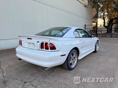 Czwarte zdjęcie samochodu z boku: 1997 FORD MUSTANG COBRA VIN:1FALP47V5VF111087 - miniatura