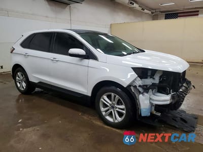Czwarte zdjęcie samochodu z boku: 2020 FORD EDGE SEL VIN:2FMPK4J99LBB27700 - miniatura