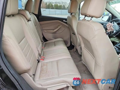 Zdjęcie 11 z 13 samochodu: 2014 FORD ESCAPE TITANIUM VIN:1FMCU0JX4EUD80212 - miniatura