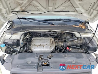 Zdjęcie 12 z 13 samochodu: 2004 HONDA PILOT EXL VIN:2HKYF18774H594183 - miniatura