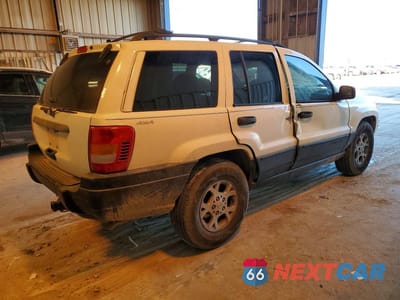 Trzecie zdjęcie samochodu z tyłu: 1999 JEEP GRAND CHEROKEE LAREDO VIN:1J4GW58S6XC508704 - miniatura