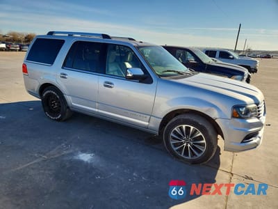 Czwarte zdjęcie samochodu z boku: 2015 LINCOLN TOWNHOUSE NAVIGATOR VIN:5LMJJ2HT7FEJ09359 - miniatura