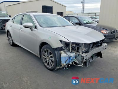 Czwarte zdjęcie samochodu z boku: 2016 LEXUS ES 300H BASE VIN:JTHBW1GG7G2111643 - miniatura