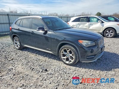 Czwarte zdjęcie samochodu z boku: 2015 BMW X1 SDRIVE28I VIN:WBAVM1C5XFV315534 - miniatura