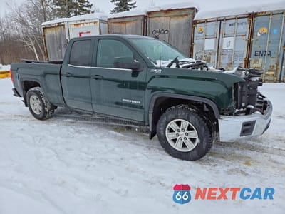 Czwarte zdjęcie samochodu z boku: 2014 GMC SIERRA K1500 SLE VIN:1GTV2UECXEZ386939 - miniatura