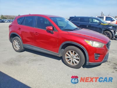 Czwarte zdjęcie samochodu z boku: 2016 MAZDA CX-5 SPORT VIN:JM3KE2BY5G0642580 - miniatura