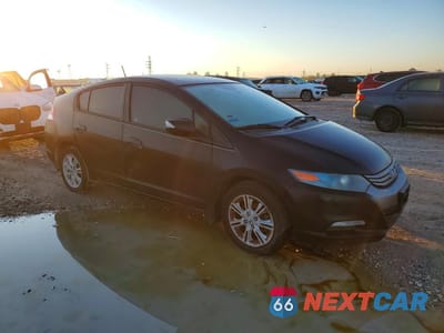 Czwarte zdjęcie samochodu z boku: 2010 HONDA INSIGHT EX VIN:JHMZE2H79AS043231 - miniatura