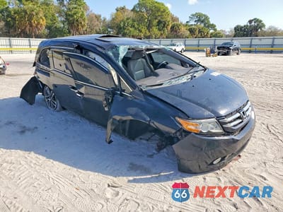 Czwarte zdjęcie samochodu z boku: 2014 HONDA ODYSSEY TOURING VIN:5FNRL5H93EB041066 - miniatura