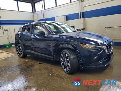 Czwarte zdjęcie samochodu z boku: 2019 MAZDA CX-3 TOURING VIN:JM1DKFC71K0408064 - miniatura