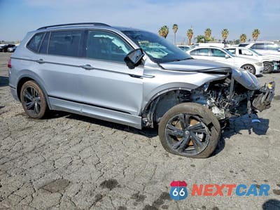 Czwarte zdjęcie samochodu z boku: 2024 VOLKSWAGEN TIGUAN SE R-LINE BLACK VIN:3VVCB7AX9RM051519 - miniatura