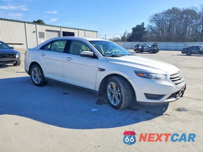 Czwarte zdjęcie samochodu z boku: 2018 FORD TAURUS SEL VIN:1FAHP2E83JG125386 - miniatura