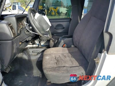Zdjęcie 7 z 12 samochodu: 2004 JEEP WRANGLER / TJ SPORT VIN:1J4FA49S54P723627 - miniatura