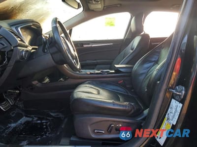 Zdjęcie 7 z 12 samochodu: 2013 FORD FUSION TITANIUM VIN:3FA6P0K91DR274997 - miniatura