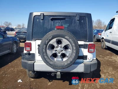 Zdjęcie 6 z 11 samochodu: 2015 JEEP WRANGLER UNLIMITED SAHARA VIN:1C4BJWEG9FL718118 - miniatura