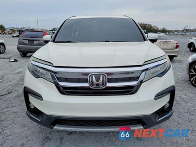 Piąte zdjęcie samochodu w środku: 2019 HONDA PILOT TOURING VIN:5FNYF5H67KB002002 - miniatura
