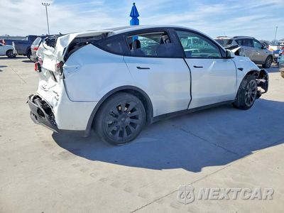 Trzecie zdjęcie samochodu z tyłu: 2023 TESLA MODEL Y VIN:7SAYGDEE2PA041199 - miniatura