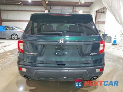 Zdjęcie 6 z 12 samochodu: 2019 HONDA PASSPORT EXL VIN:5FNYF8H57KB009265 - miniatura