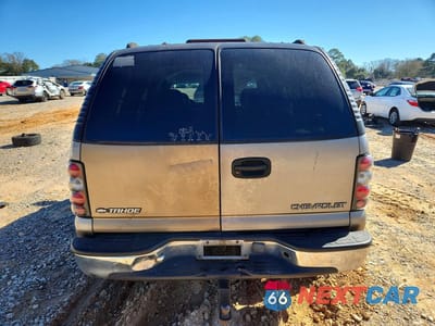 Zdjęcie 6 z 12 samochodu: 2001 CHEVROLET TAHOE C1500 VIN:1GNEC13T11J191651 - miniatura