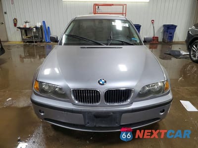 Piąte zdjęcie samochodu w środku: 2003 BMW 325 I VIN:WBAET37423NJ38196 - miniatura