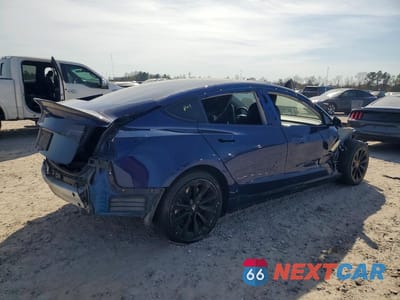 Trzecie zdjęcie samochodu z tyłu: 2021 TESLA MODEL 3 VIN:5YJ3E1EA4MF060716 - miniatura