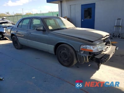 Czwarte zdjęcie samochodu z boku: 2004 MERCURY GRAND MARQUIS GS VIN:2MEFM74W54X646842 - miniatura