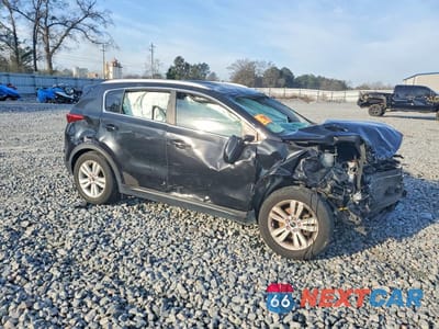 Czwarte zdjęcie samochodu z boku: 2017 KIA SPORTAGE LX VIN:KNDPM3AC9H7042814 - miniatura
