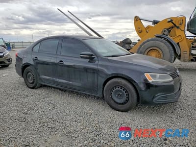 Czwarte zdjęcie samochodu z boku: 2012 VOLKSWAGEN JETTA SE VIN:3VWDX7AJ8CM070650 - miniatura