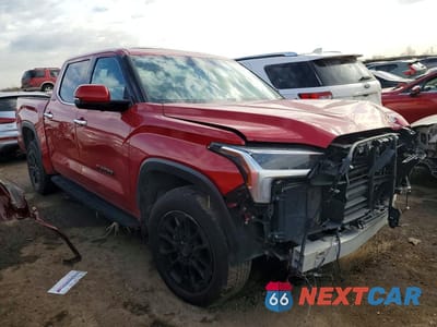 Czwarte zdjęcie samochodu z boku: 2022 TOYOTA TUNDRA VIN:5TFJA5DB1NX005457 - miniatura