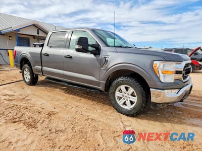 Czwarte zdjęcie samochodu z boku: 2022 FORD F150 SUPERCREW VIN:1FTFW1E59NKE65357 - miniatura