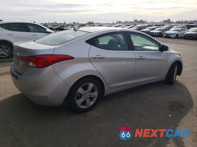 Trzecie zdjęcie samochodu z tyłu: 2013 HYUNDAI ELANTRA GLS VIN:KMHDH4AE0DU583899 - miniatura