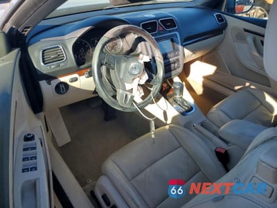 Zdjęcie 8 z 12 samochodu: 2012 VOLKSWAGEN EOS LUX VIN:WVWFW7AH4CV008356 - miniatura