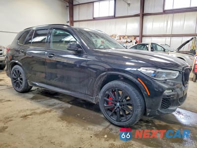 Czwarte zdjęcie samochodu z boku: 2021 BMW X5 M50I VIN:5UXJU4C08M9F56328 - miniatura