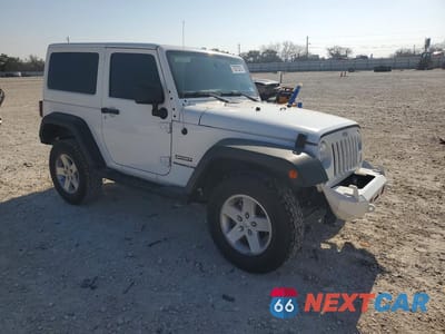 Czwarte zdjęcie samochodu z boku: 2017 JEEP WRANGLER SPORT VIN:1C4AJWAG5HL652347 - miniatura