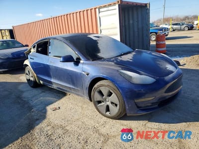 Czwarte zdjęcie samochodu z boku: 2023 TESLA MODEL 3 VIN:5YJ3E1EA6PF457431 - miniatura