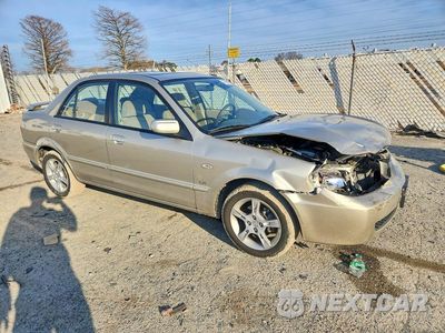 Czwarte zdjęcie samochodu z boku: 2003 MAZDA PROTEGE DX VIN:JM1BJ225830108526 - miniatura