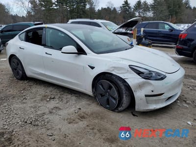 Czwarte zdjęcie samochodu z boku: 2021 TESLA MODEL 3 VIN:5YJ3E1EB5MF002350 - miniatura